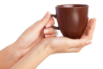 Female hand holding a cup