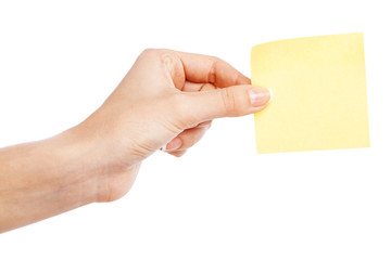 Female hand holding a sticky note