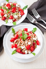 Salad with spelt, rucola, cherry tomato, greek cheese feta