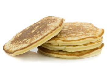 Fresh baked pancakes on a white background