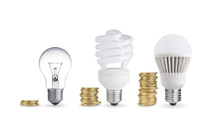 Money saved in different kinds of light bulbs. Isolated on white