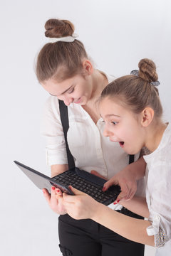teen girls with tablet