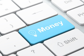 Finance concept: Light Bulb and Money on keyboard background