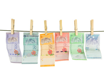 Malaysia Bank Notes money hanging on a clothes line