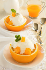Ice cream in orange peel.