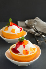 Ice cream in orange peel.