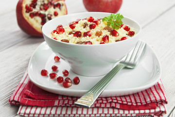 Couscous with pomegranate, raisins and spices