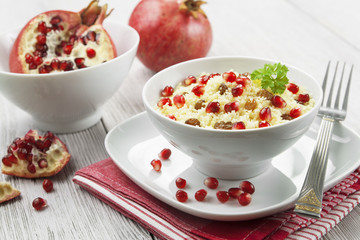 Couscous with pomegranate, raisins and spices
