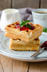 Waffles with jam for breakfast