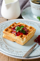 Waffles with jam for breakfast