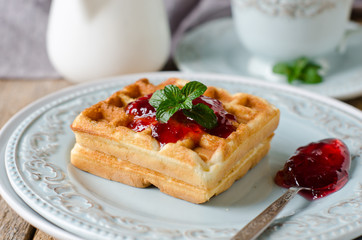 Waffles with jam for breakfast