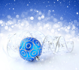Christmas blue and silver decorations on festive background