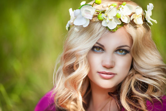 Beautiful healthy woman with natural makeup anf wreath