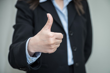 Woman giving thumbs up