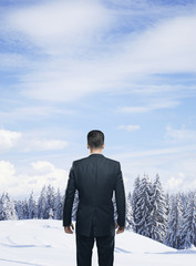 businessman looking forest