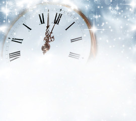 Fototapeta na wymiar Old clock with stars and snowflakes