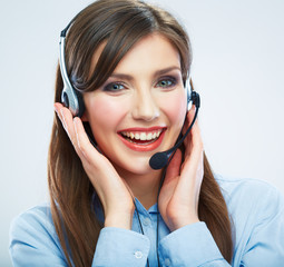 Smiling woman call center operator touching headsed. Close up b