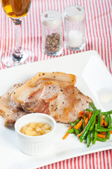 pork steak with apple sauce and french beans