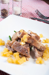 sliced pork steak with french beans and apple diced sauce