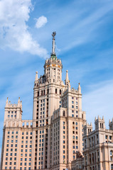 Fototapeta na wymiar Stalin skyscraper on the waterfront in Moscow, Russia