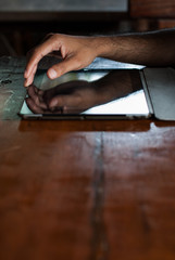 Fototapeta na wymiar man holding digital tablet, closeup