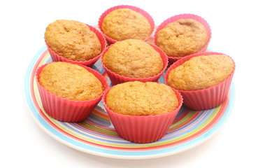 Fresh baked carrot muffins in red silicone cups