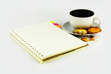 Obraz na płótnie Canvas cup of coffee with cookie and notebook isolated on white backgro