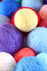 stack of colorful balls of wool