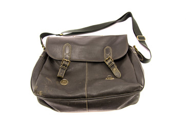 Naklejka premium old black leather bag isolated on white