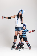 Mother and son in roller skates