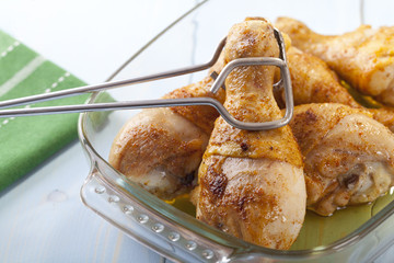 Roasted marinated chicken drumsticks.
