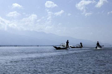 Fishermen on water
