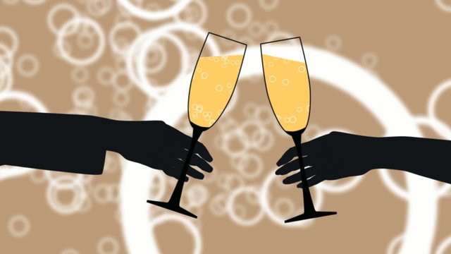 Zwei Personen mit Champagner stossen an
