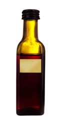 Old medicine bottle with label, isolated over white