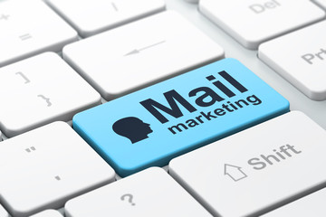 Advertising concept: Head and Mail Marketing on keyboard