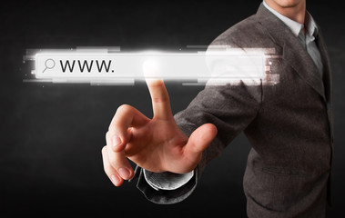 Young businessman touching web browser address bar with www sign