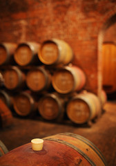 Barrels in the cellar with cork