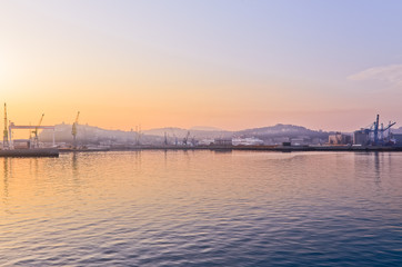 Naklejka premium Ferry boat under golden sun on Adriatic sea,Italy