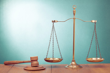 Law scales, judge gavel on table. Symbol of justice concept