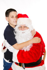 Boy Embracing Santa Claus