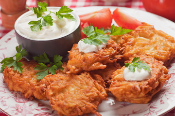 Latke, potato pancake with sour cream