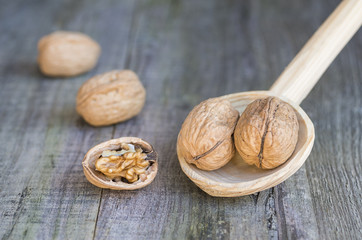 Nuts on wooden spoon