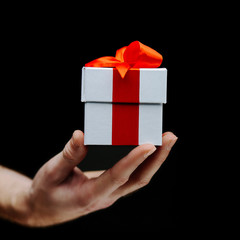 Hand with giftbox
