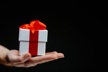 Hand with giftbox