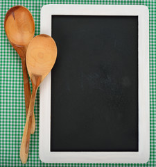 Writing board and wooden spoons