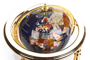 Globe Sculpture on brown background
