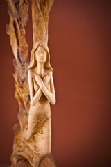 Woman Sculpture on brown background