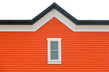 Exterior wall orange siding window and roof trim