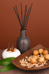aromatherapy setting on brown background .
