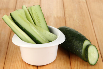 Bright fresh cucumber cut up slices in bowl